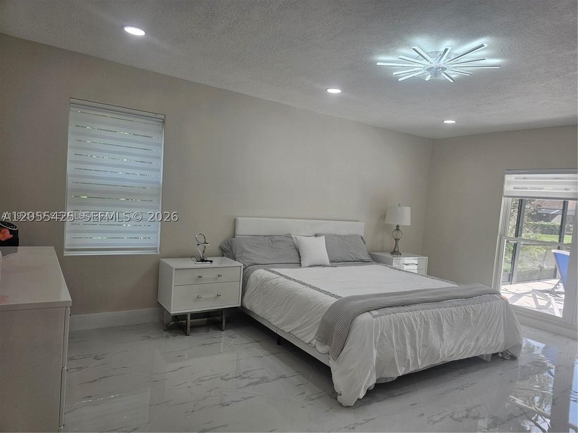 Modern heated pool and spa 4/2 Single-story residence in PGA - photo 4