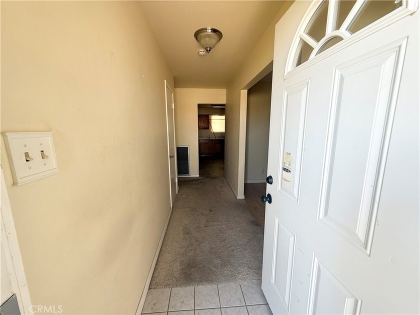 Discover the potential in this 3-bedroom, 2-bath home offering - photo 4