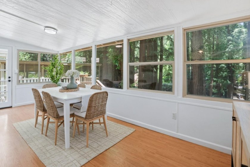 Nestled beneath a canopy of majestic redwood trees on a spacious - photo 7