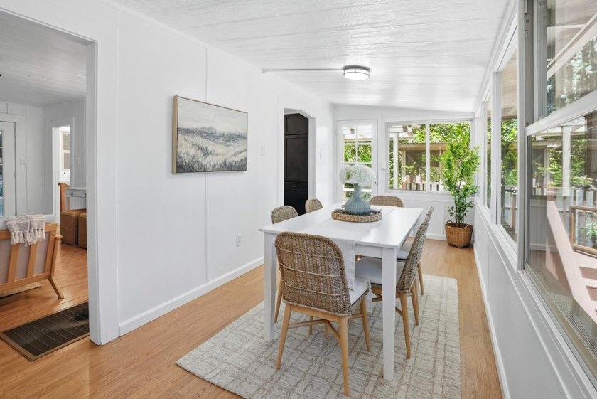Nestled beneath a canopy of majestic redwood trees on a spacious - photo 8