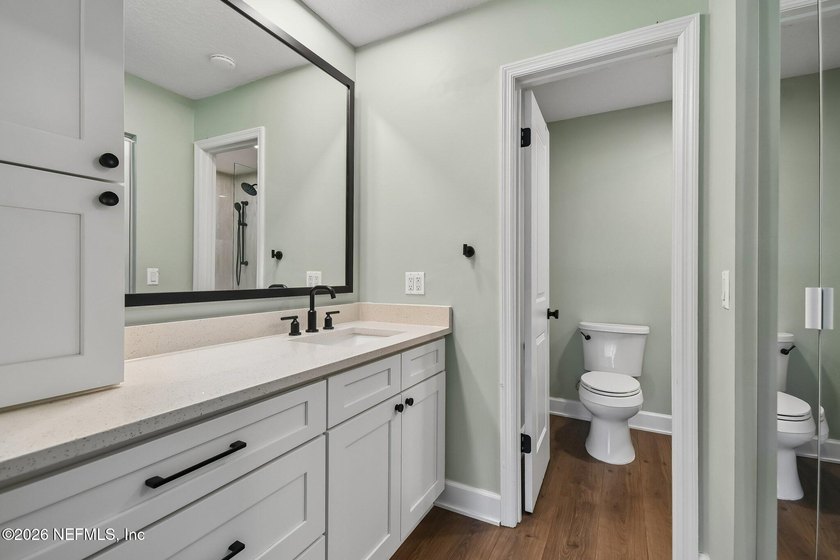 This beautifully renovated 2-bedroom, 2-bath ground-floor condo - photo 8