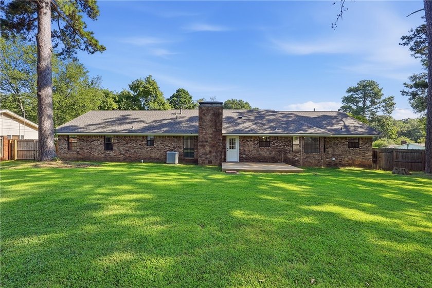 Welcome to 2503 W. 2nd Place in Russellville! Tucked away on the - photo 3