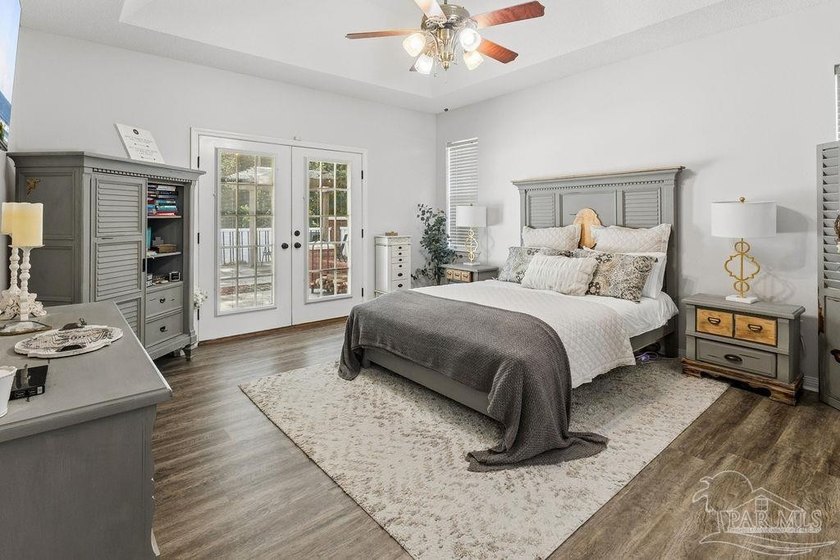 Fully renovated and move-in ready! Nestled within a serene gated - photo 22