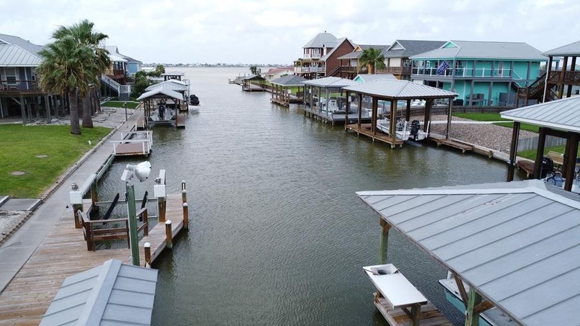 Build your dream home on this canal front lot and a half. Water - photo 4