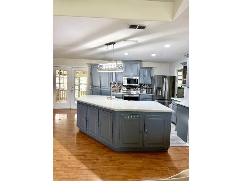 Beautiful 4 Bedroom, 2 bath home with exceptional outdoor living - photo 8
