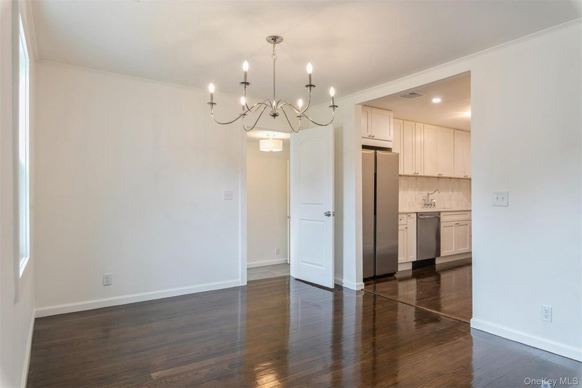 Welcome home to this beautifully renovated 4 bedroom, 2 full - photo 13