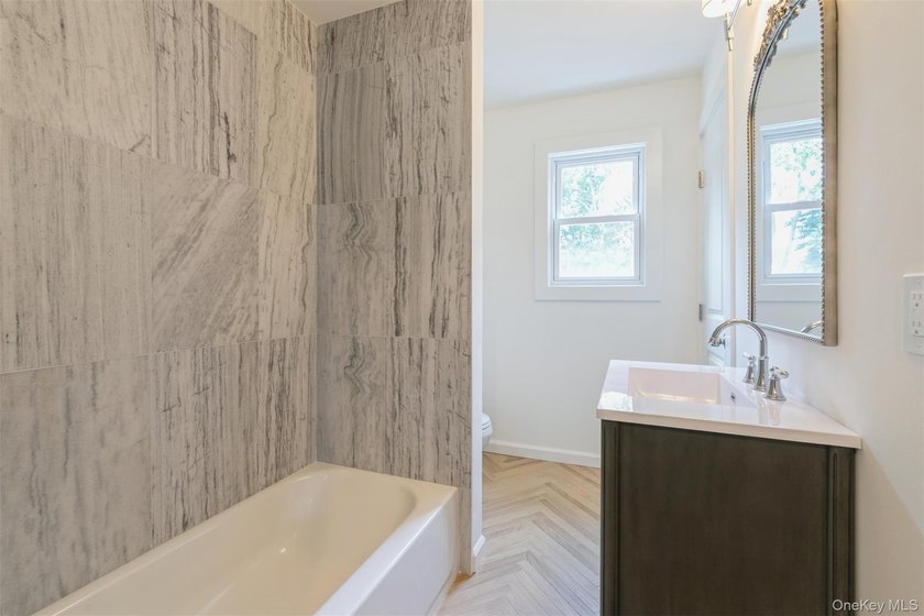 Welcome home to this beautifully renovated 4 bedroom, 2 full - photo 19