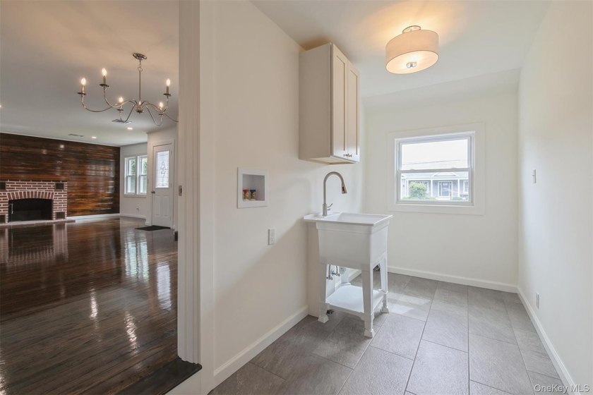 Welcome home to this beautifully renovated 4 bedroom, 2 full - photo 32