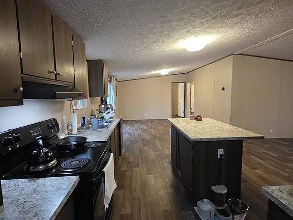 Set on 10 acres, this 4-bedroom, 2-bath home offers space - photo 3