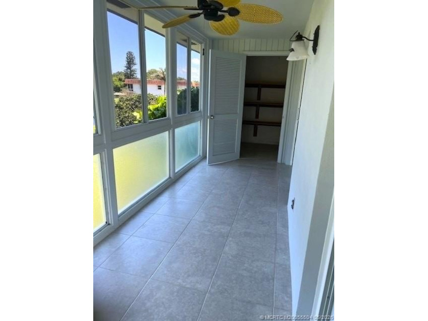 Beautifully tiled 2nd floor 2-bedroom 2-bath unfurnished condo - photo 10