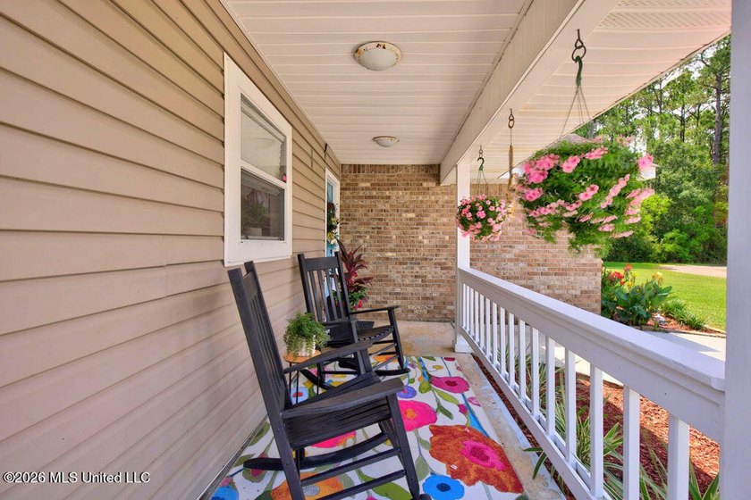 Welcome home to this inviting 4-bedroom, 2-bath home situated on - photo 4