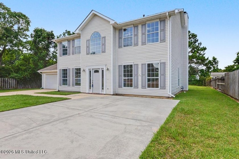 Beautifully updated 4-bedroom, 3-bath home located in the highly - photo 2