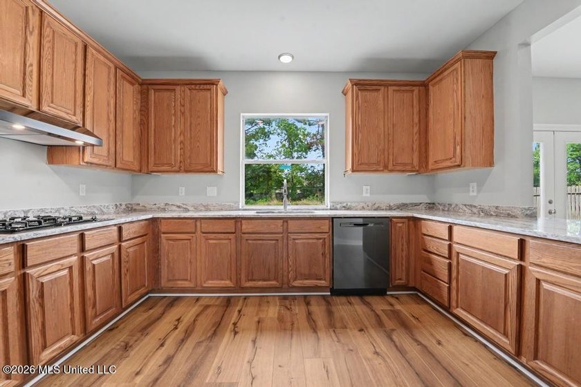 Beautifully updated 4-bedroom, 3-bath home located in the highly - photo 10
