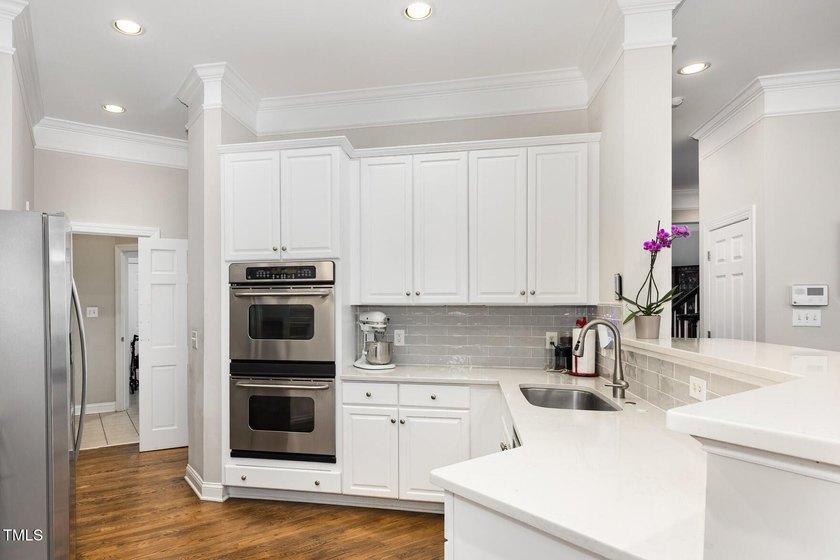 Experience refined golf course living in this luxury townhome - photo 3