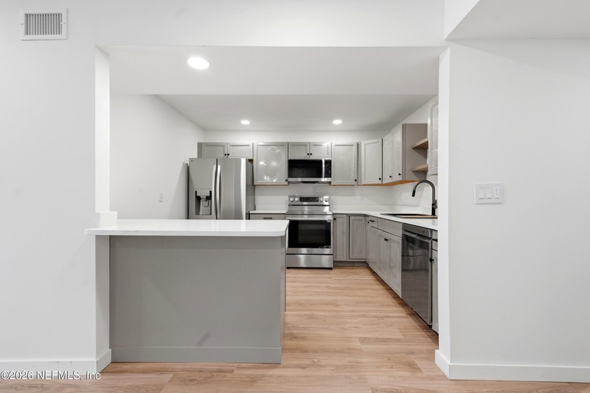Why rent when you can own? Beautifully renovated lakefront condo - photo 6