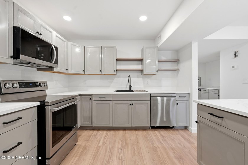 Why rent when you can own? Beautifully renovated lakefront condo - photo 7