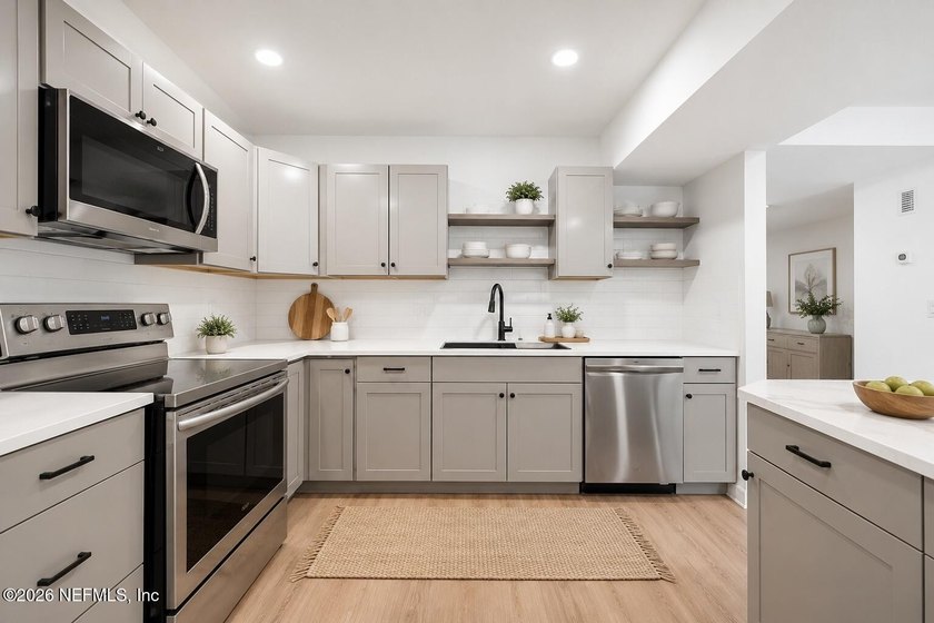 Why rent when you can own? Beautifully renovated lakefront condo - photo 8