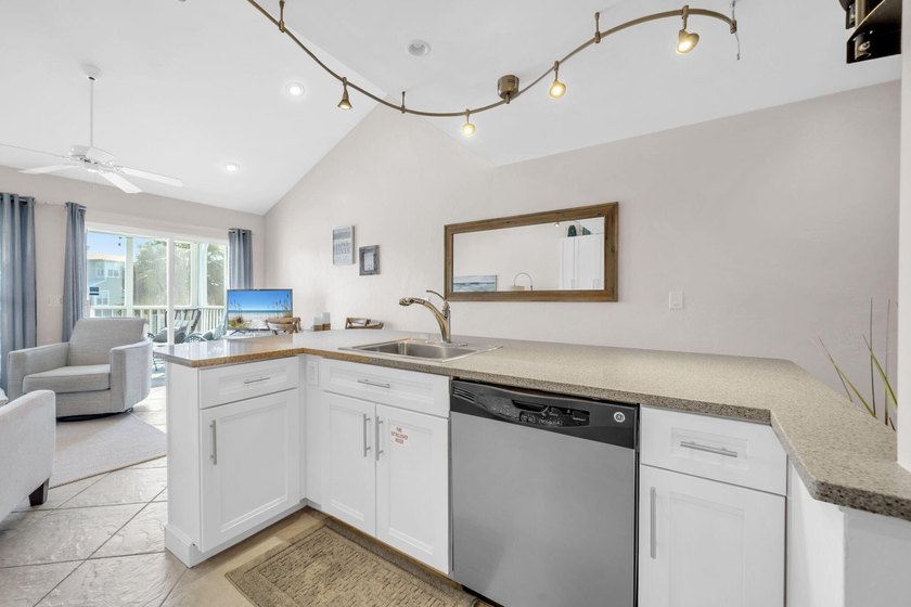 Nestled in a private, gated, low-density coastal community with - photo 15