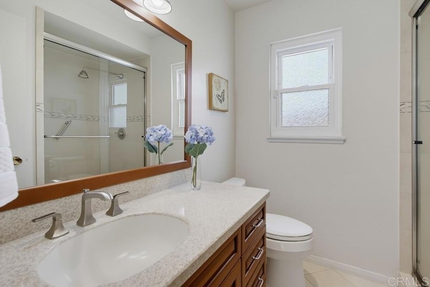 Welcome to this beautifully maintained Serra Mesa home where the - photo 21