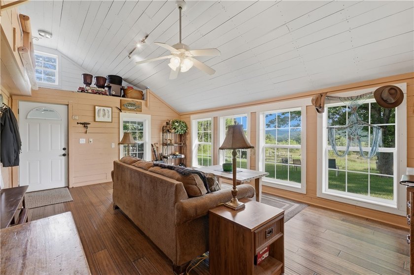 Positioned on 5.14 acres in a scenic Ozark Mountain setting near - photo 5