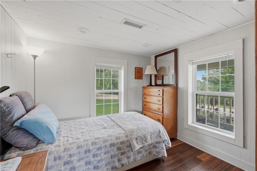 Positioned on 5.14 acres in a scenic Ozark Mountain setting near - photo 6