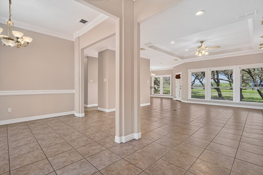 Nestled beneath a canopy of majestic oak trees and overlooking - photo 8