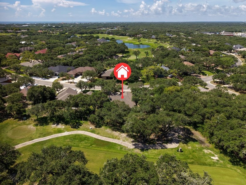 Nestled beneath a canopy of majestic oak trees and overlooking - photo 10