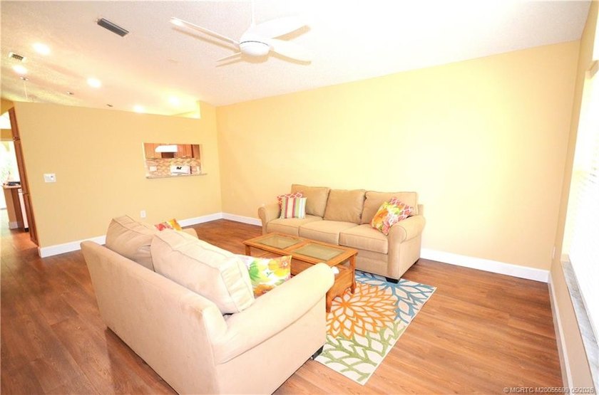 Move right in. This cozy villa has been recently updated and is - photo 6