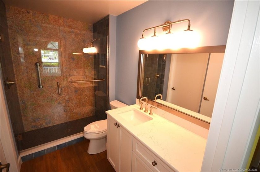 Move right in. This cozy villa has been recently updated and is - photo 9