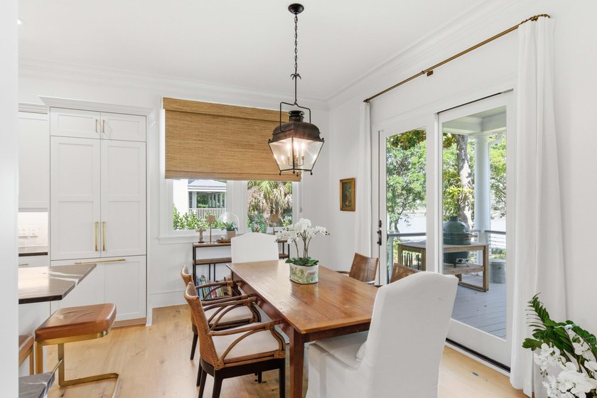 This elevated waterfront home with a private dock has been - photo 19