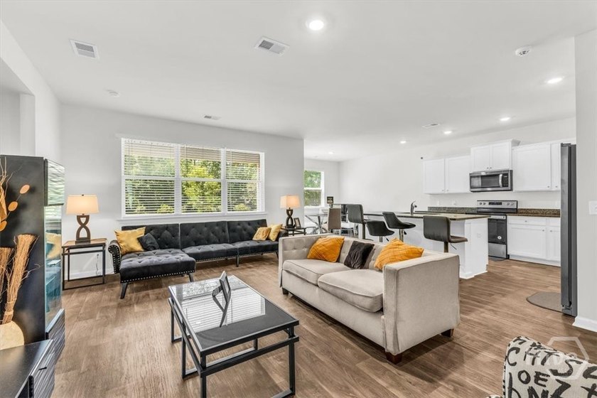 Beautifully maintained 4-bedroom, 2-bath home offering 1,928 - photo 5