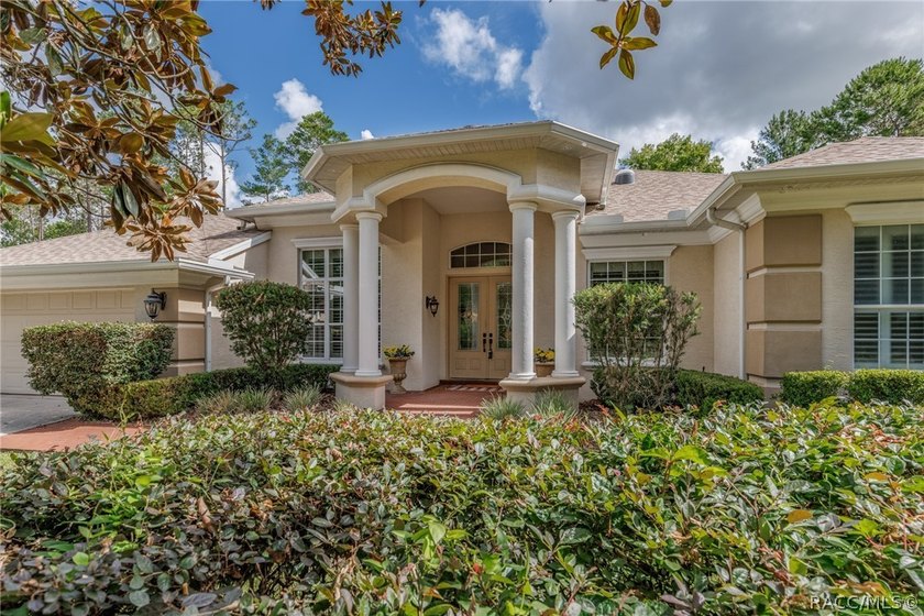 EXQUISTIE FLORIDA LIVING ABOUNDS IN THIS INVITING 3/2/2 WITH DEN - photo 3