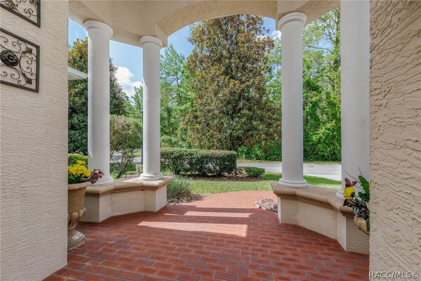 EXQUISTIE FLORIDA LIVING ABOUNDS IN THIS INVITING 3/2/2 WITH DEN - photo 5