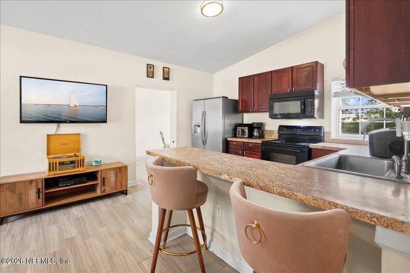 Energy efficient living meets timeless charm! Welcome to 9823 - photo 6