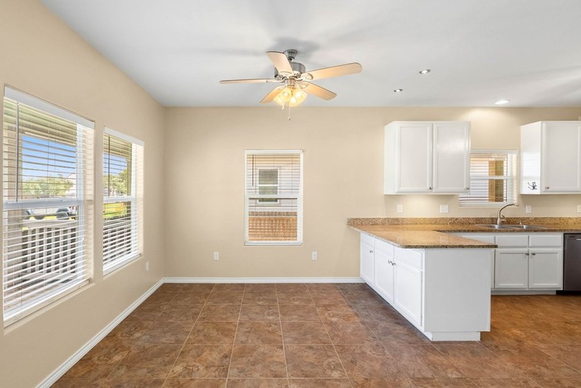 Situated on two spacious lots, this charming 3-bedroom, 2-bath - photo 6