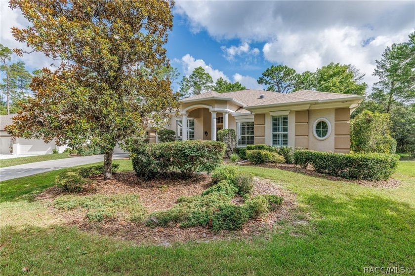 EXQUISTIE FLORIDA LIVING ABOUNDS IN THIS INVITING 3/2/2 WITH DEN - photo 6