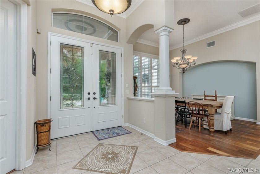 EXQUISTIE FLORIDA LIVING ABOUNDS IN THIS INVITING 3/2/2 WITH DEN - photo 7