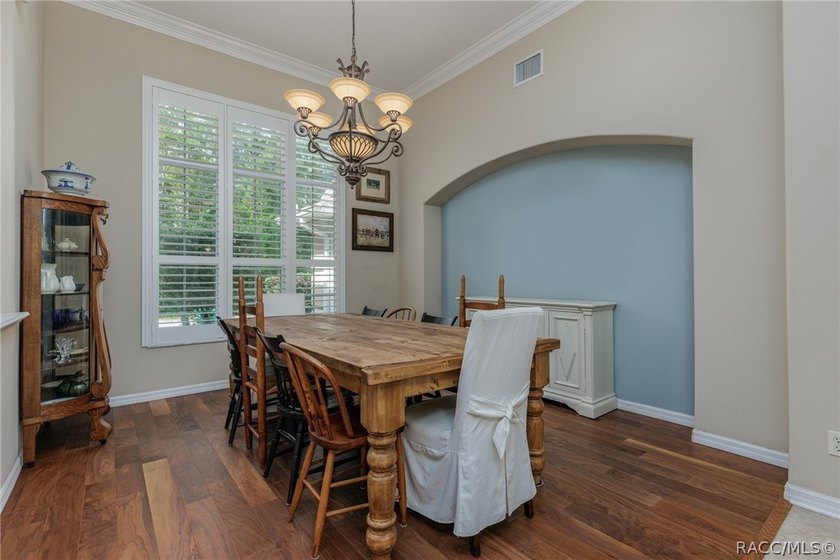 EXQUISTIE FLORIDA LIVING ABOUNDS IN THIS INVITING 3/2/2 WITH DEN - photo 8