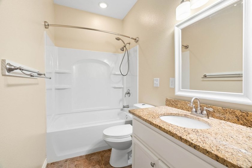 Situated on two spacious lots, this charming 3-bedroom, 2-bath - photo 10