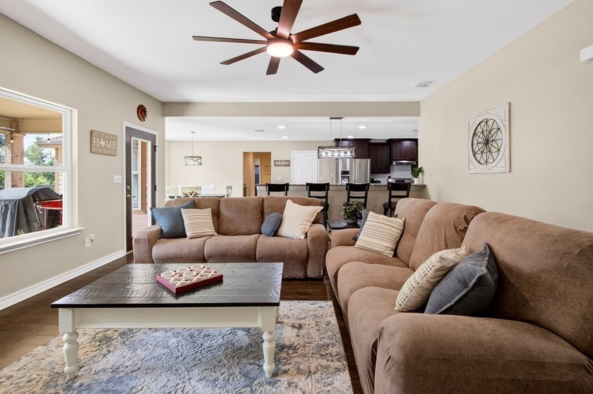 Welcome to Coastal Wild Wood, y'all! This 4-bedroom, 3-bath - photo 5