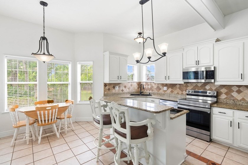 Come see this traditional 4 bedroom, 3 1/2 bath home situated on - photo 8