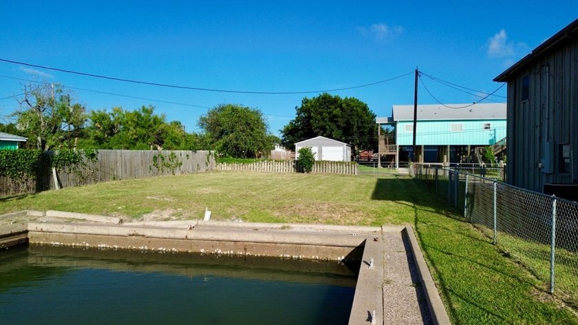 Build your dream coastal home on the beautiful canal-front lot - photo 2