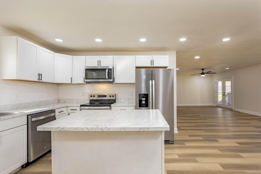 Welcome to this stunning, completely renovated 4-bedroom - photo 4