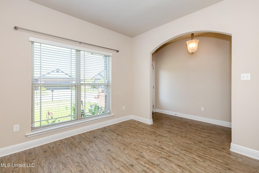 Welcome home to this charming 3-bedroom, 2-bath home in one of - photo 8