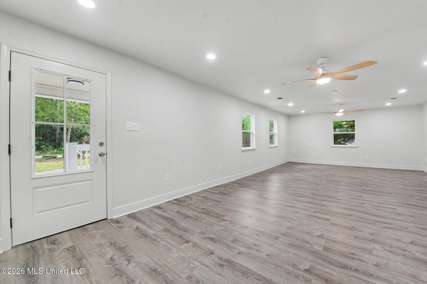 What a beautifully remodeled home on two lots with a metal - photo 4