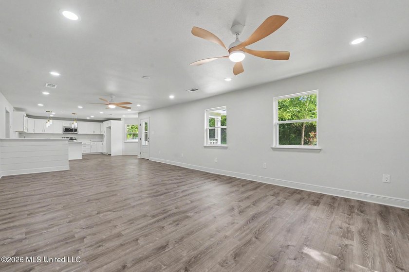 What a beautifully remodeled home on two lots with a metal - photo 7