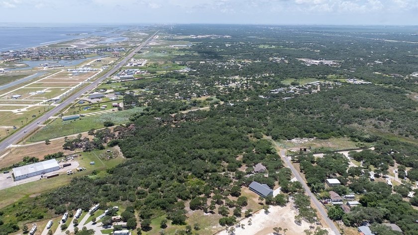 This lot has just under 2 acres of raw land that is located - photo 5