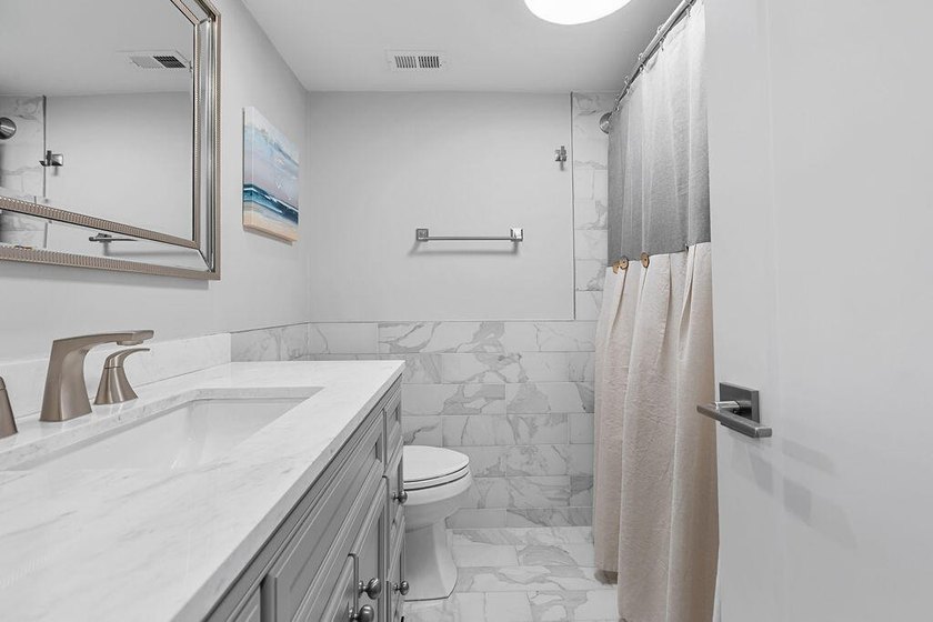 Beautifully updated two-bedroom townhouse with long tidal marsh - photo 24