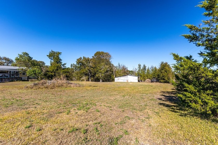 This true country-style home offers privacy, flexibility, and - photo 3