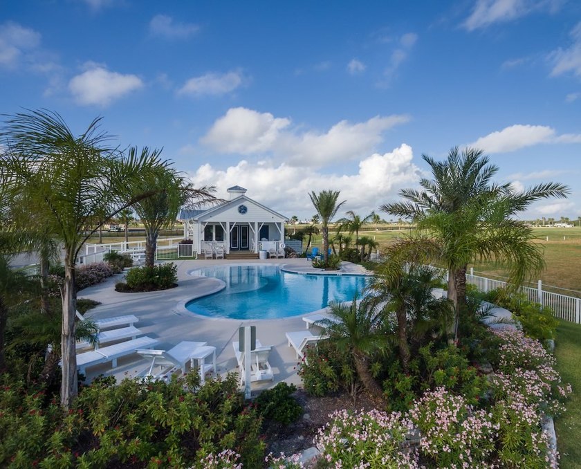 Lot 30 is a large corner homesite at the edge of the bay, inside - photo 6